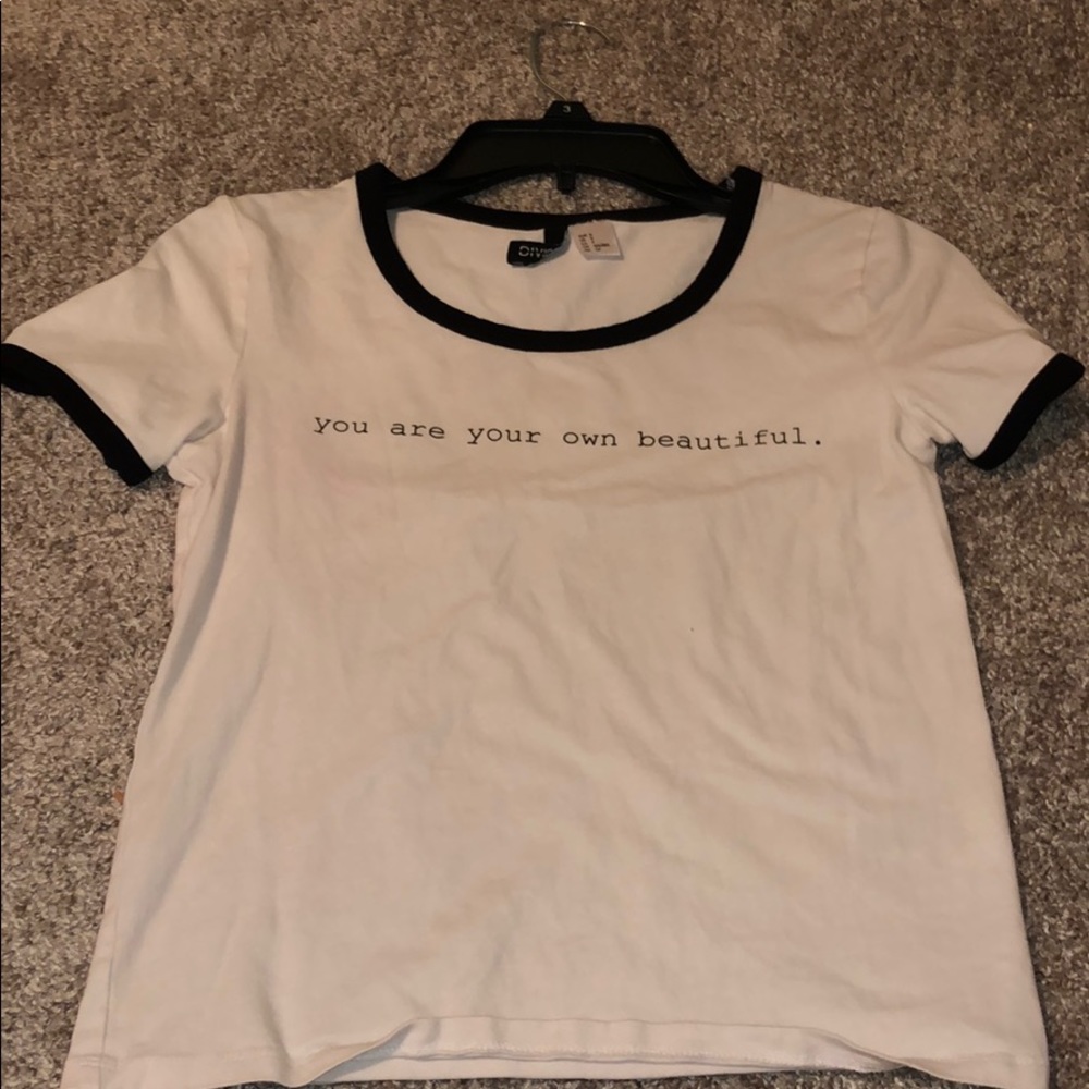 “You are your own beautiful.”Black and white shirt